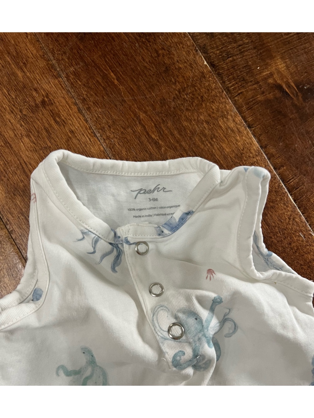 Posh White Infant Romper with Blue Octopus Accents